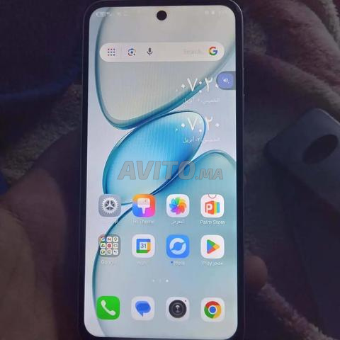 Téléphone à vendre, encore propre - 2