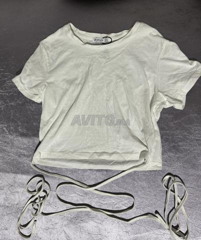 Crop top Stradivarius blanc à nouer taille M