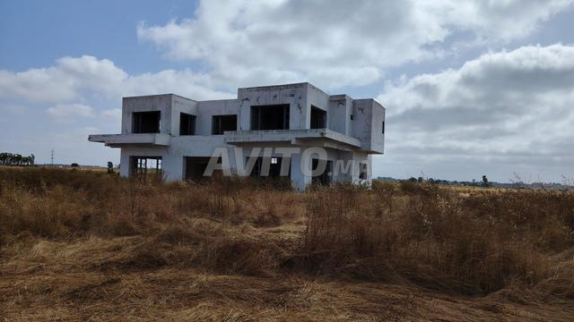 مزرعة على هكتار واحد مع فيلا في بوسكورة بنسليمان
