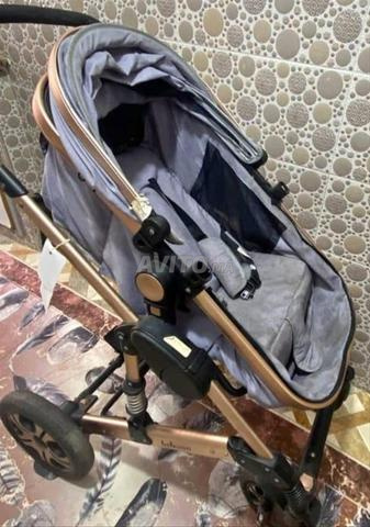 عربة أطفال بوسيت دو فاص