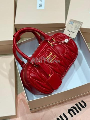 حقيبة ميو ميو بألوان MM0129