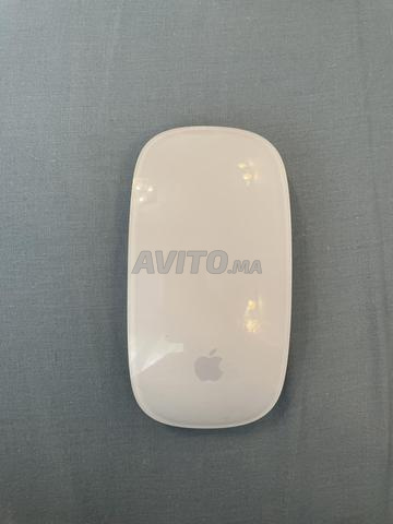 Apple Magic Mouse مع بطاريات