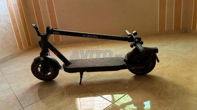 Trottinette électrique Xiaomi 5 elite 45km avec sa boîte d'origine