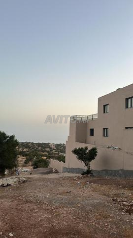 Terrain de 750 m2 à Aït Bihi avec vue sur mer à vendre