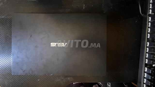 حاسوب محمول Asus N4020 - 2