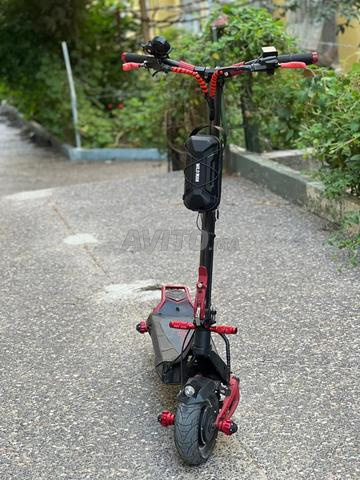 Trottinette double moteur très propre avec papiers