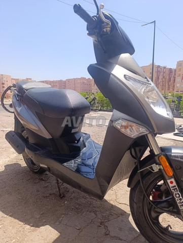 Kymco 4T en excellent état - 2