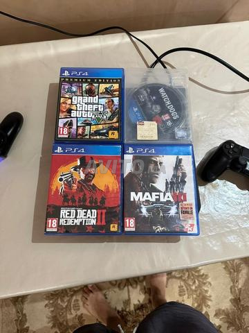 PS4 en bon état avec 5 CD - 2