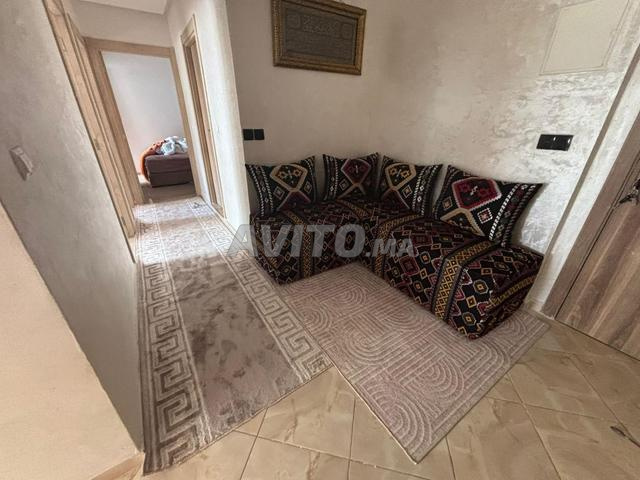 Bancs 143 et 114 avec matelas et coussins dans leur immeuble