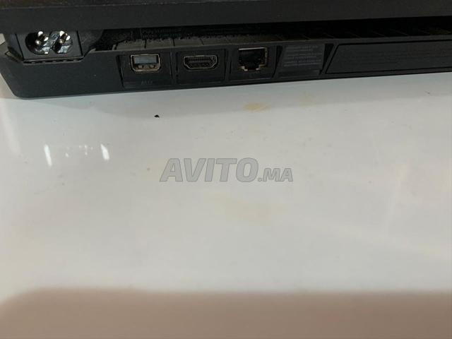 Négociable. PlayStation 4 Slim - 2