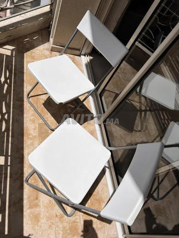 كرسي IKEA قابل للطي أبيض