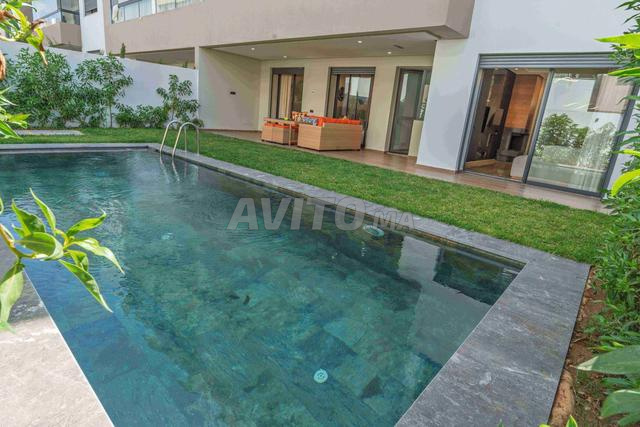 Rez-de-jardin meublé avec piscine privative