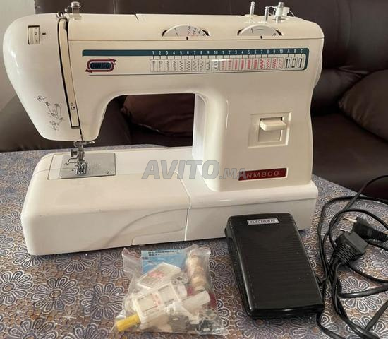ماكينة خياطة كهربائية QUIGG NM800