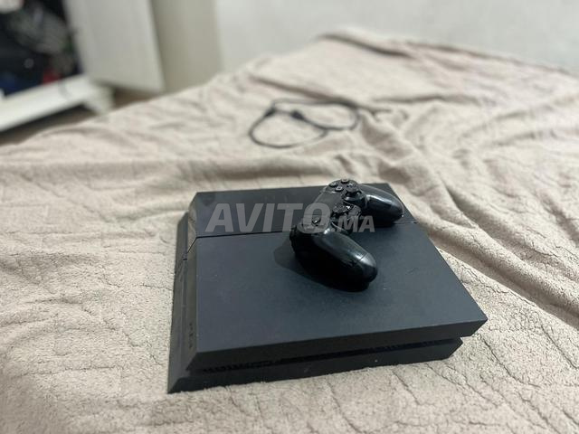 PS4 en bon état avec ses disques - 2