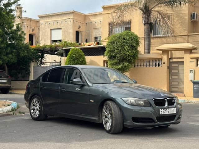 BMW Série 320i Essence Manuelle 2010 - 2