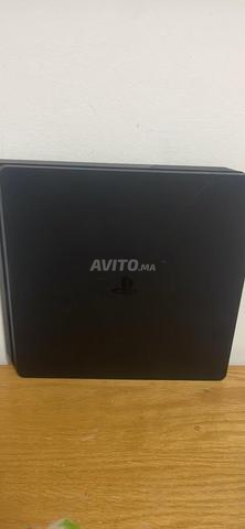 PlayStation 4 slim 800 go et 7 disques - 2