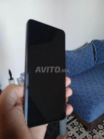 Redmi note 14 256g avec pochette - 2
