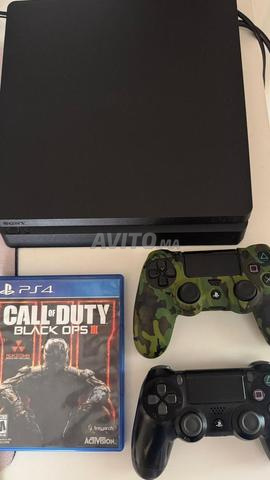 Ps4 slim avec 2 manettes et plusieurs jeux - 2