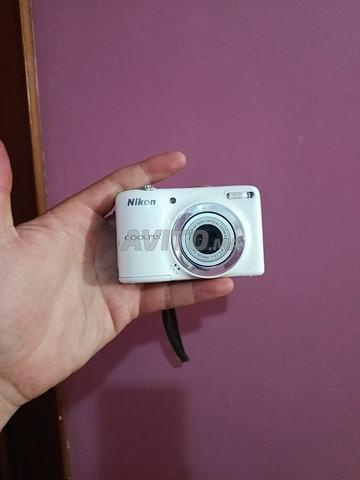 Appareil photo Nikon fonctionnant avec piles AA
