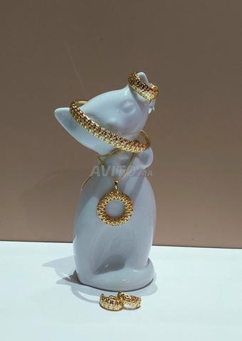 Ensemble de bijoux pour femmes avec un design en maille plaqué or. - 2