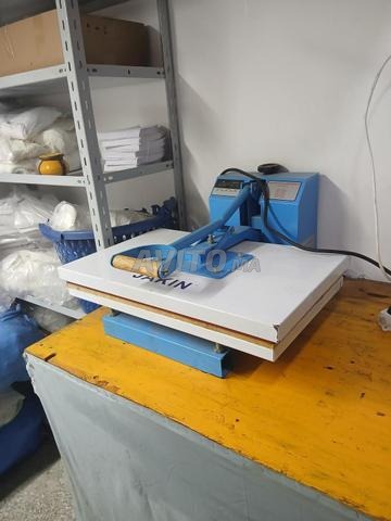 Machine de transfert thermique pour l'impression