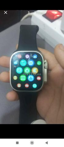 Montre connectée d'occasion avec son chargeur