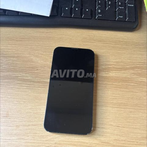 iPhone 13 128go très bon état - 2