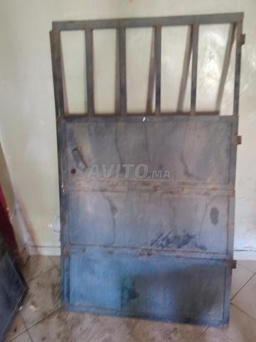 Porte de garage et 2 rideaux de salon à vendre