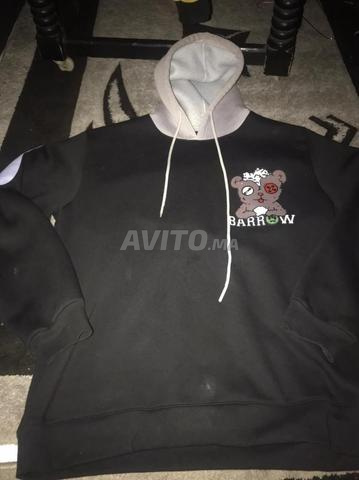 Veste à capuche au design unique. - 2