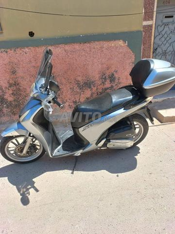 SH روبوت 125i - 2