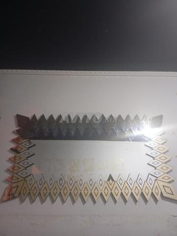 Miroir encore en bon état pour salons de coiffure, négociable
