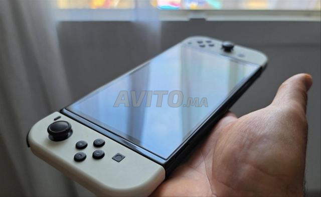 Nintendo Switch Oled en très bon état - 2