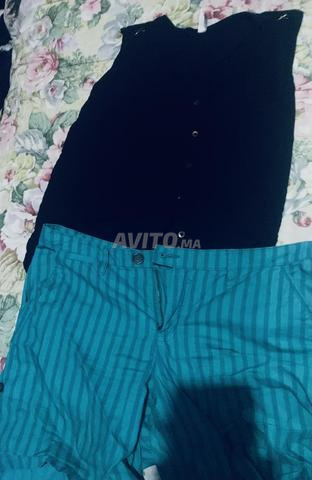 Chemise noire et short rayé (taille M) - Excellent état
