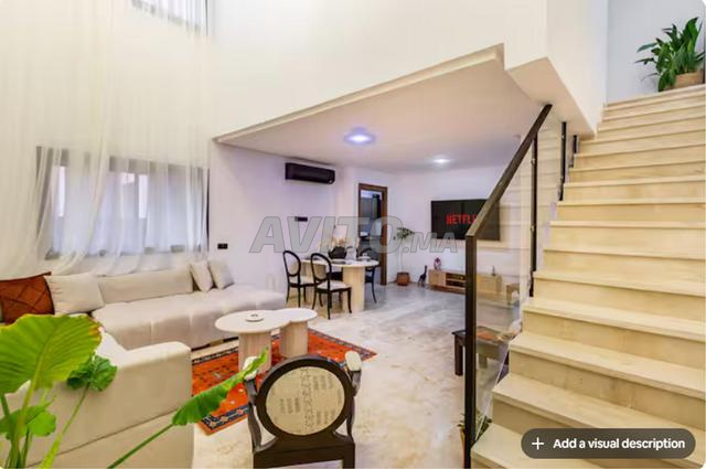 Duplex de Luxe au Cœur de Guéliz / Vue Piscine