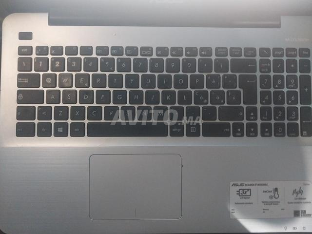 كمبيوتر محمول ASUS (متضرر)