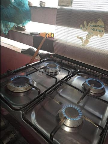 Cuisinière 4 feux en bon état marque goldvision inox