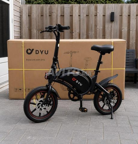 Vélo électrique neuf encore scellé dans sa boîte