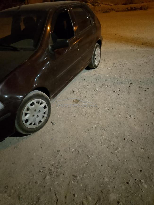 Palio mazout 2004 n9ia Kayna fbiougra 