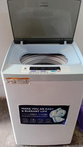 Machine (lave-linge) automatique - 2
