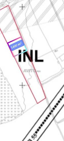 أرض 1400 متر مربع (منطقة INL للأنشطة) صناعية