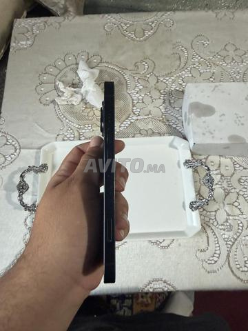 آيفون 14 عادي 128 جيجا مع كابل آبل الأصلي