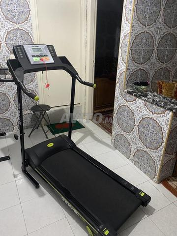 Appareil de sport : tapis roulant