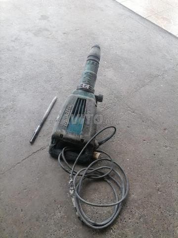 مطرقة تخريم ماكيتا HM1214C بقوة 1510 واط – بحالة جيدة