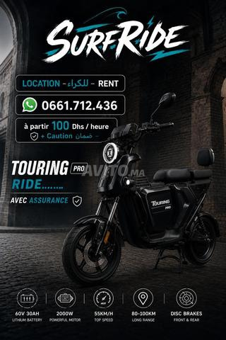 Location moto électrique Cooper Touring à louer