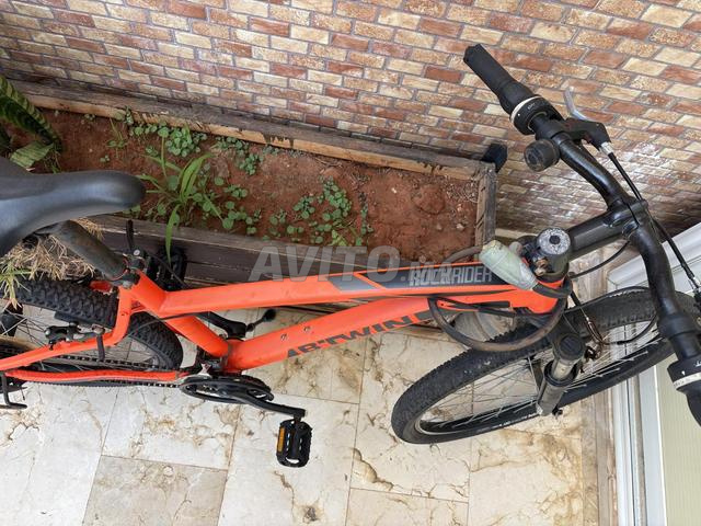 دراجة جبلية B’TWIN برتقالية – بحالة جيدة – جاهزة للركوب - 2