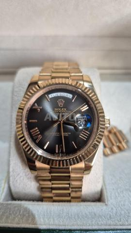 Montre Rolex Day-Date Or Rose Mouvement Suisse
