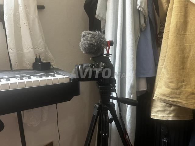 كانون D1000 - 2