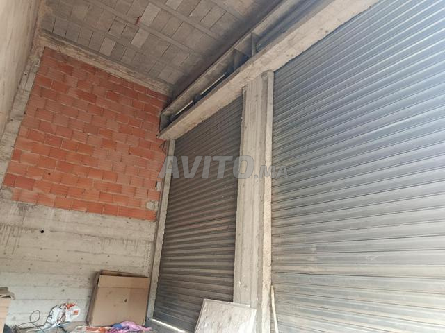Magasin à louer, route El Haj Kadour, résidence Abir - 2