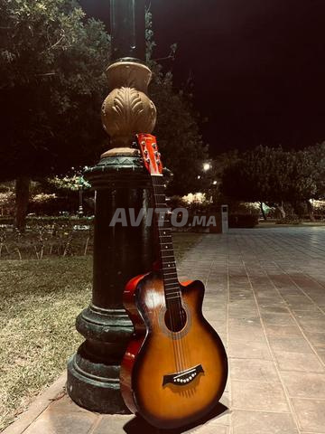 Guitare acoustique Squire Cutaway en bon état