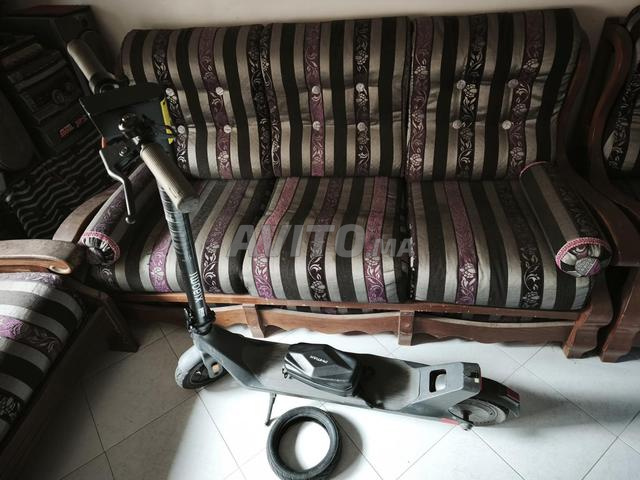 Trottinette Xiaomi Lite 4 2ème gen propre avec pneu et sac